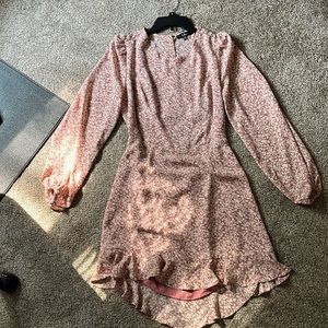 Pink floral mini dress. Size LG. Peakaboo back with button detail.